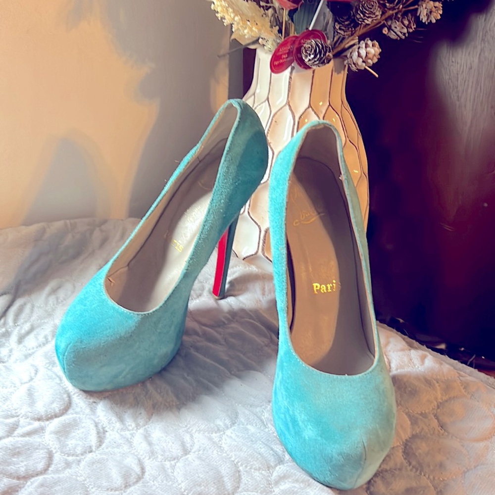 Light blue Christian Louboutin Shoes. Barely used.